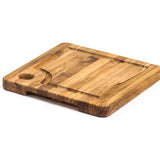 Teakhaus Marine teak wood cutting board with a smooth surface and natural grain, ideal for kitchen prep and serving.