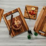 Teakhauss Marine teak wood cutting board with smooth surface and natural grain, ideal for kitchen use and food preparation.