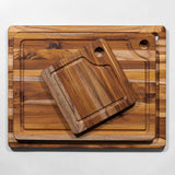 Teakhaus Marine teak cutting board with natural wood grain, rectangular shape, durable teak wood for kitchen use.