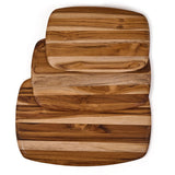 Rectangular TEAKHAUS teak wood cutting board with smooth surface and natural wood grain, ideal for kitchen prep and serving.