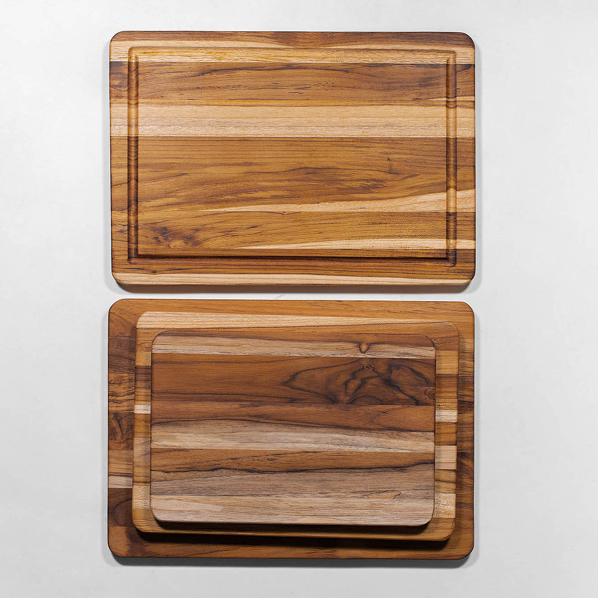 Teakhaus TEAKHAUS Essential teak cutting board made of durable teak wood for kitchen prep and slicing.