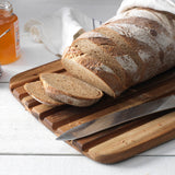 Teakhaus teak wood cutting board, ESSENTIAL series, natural teak finish, rectangular shape with smooth edges for kitchen prep.