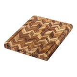 Teakhaus teak wood cutting board with herringbone pattern, ideal for preparing tea and kitchen use, natural wood finish.