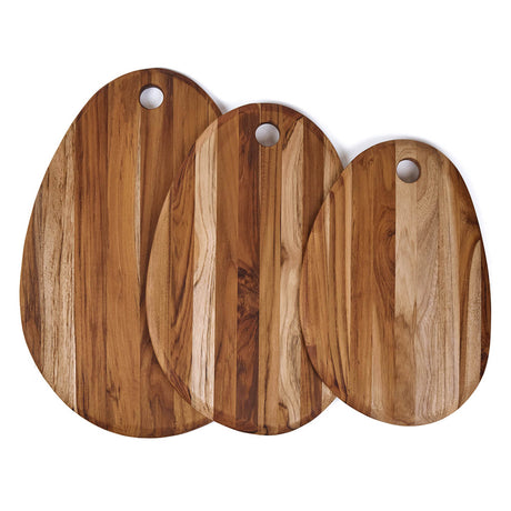 Oval TEAKHAUS teak wood cutting board with smooth surface and natural wood grain, ideal for food preparation.