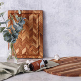 TEAKHAUS teakwood cutting board with herringbone pattern, ideal for kitchen prep and serving tea accessories.