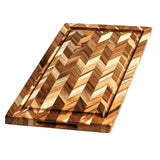Teakhaus teakwood cutting board with herringbone pattern, ideal for food prep and serving, natural wood finish.