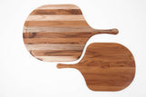 Teakhaus teak wood pizza cutting board with handles, crafted from durable teak for slicing and serving pizza.