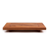 Teakhaus teak wood cutting board with a smooth surface and natural wood grain, ideal for kitchen prep or serving.