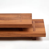 Teakhaus teak cutting board with natural wood grain, rectangular shape, ideal for kitchen food prep and serving.