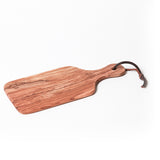 BÉRARD olivewood cutting board with handle, 26 x 12 cm, showcasing smooth polished surface and sturdy grip.