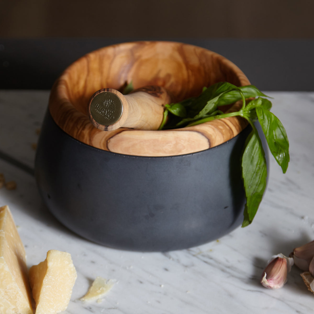 BÉRARD Millanari olive-colored mortar and pestle set for grinding spices and herbs, with a smooth, rounded design.