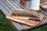 BÉRARD brown bread cutting board with 1.5 cm thickness, made of wood, on a kitchen countertop.