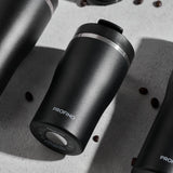 Black PROFINO Barista thermobecher with a sleek design, ideal for keeping beverages hot or cold on the go.