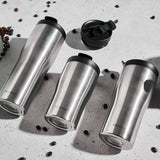 Stainless steel PROFINO Barista thermos mug with a black lid, designed for hot beverages, with a sleek, insulated travel cup appearance.