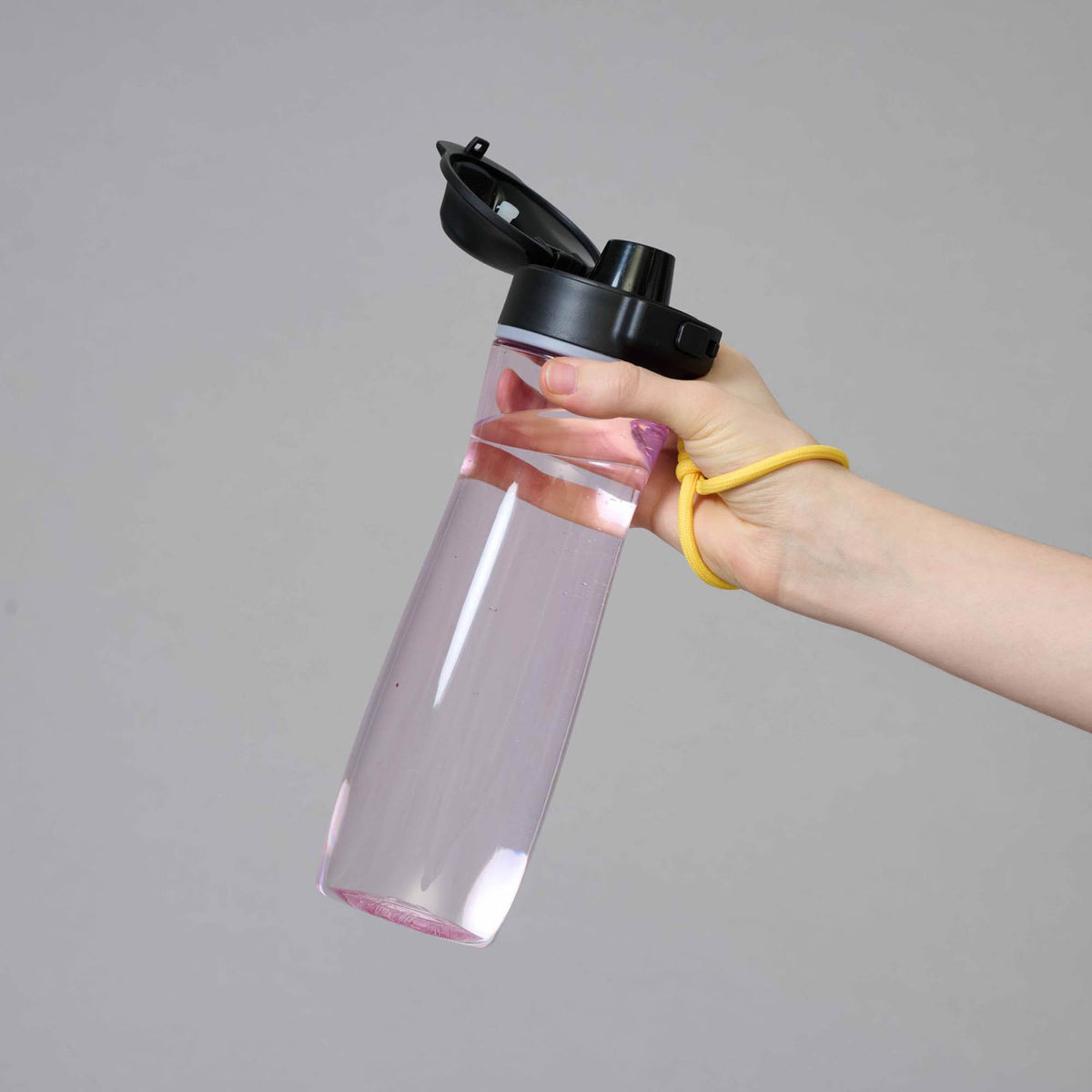 PROFINO ACTIVE 750 ml water bottle, clear plastic with black screw cap, designed for sports and hydration on the go.