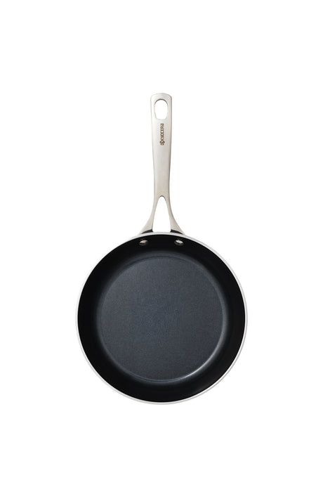 Kyocera ceramic frying pan in black with a non-stick surface, ideal for healthy cooking and easy cleaning.