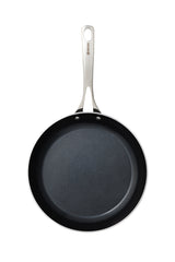 Kyocera ceramic frying pan in black with a smooth non-stick surface, ideal for versatile cooking.