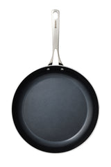 Kyocera black ceramic frying pan with non-stick surface, durable kitchen cookware for healthy cooking.