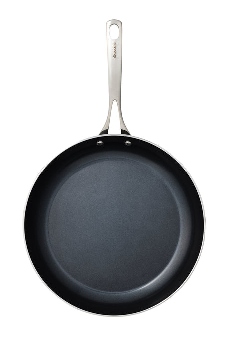 Kyocera black ceramic frying pan with non-stick surface, durable kitchen cookware for healthy cooking.