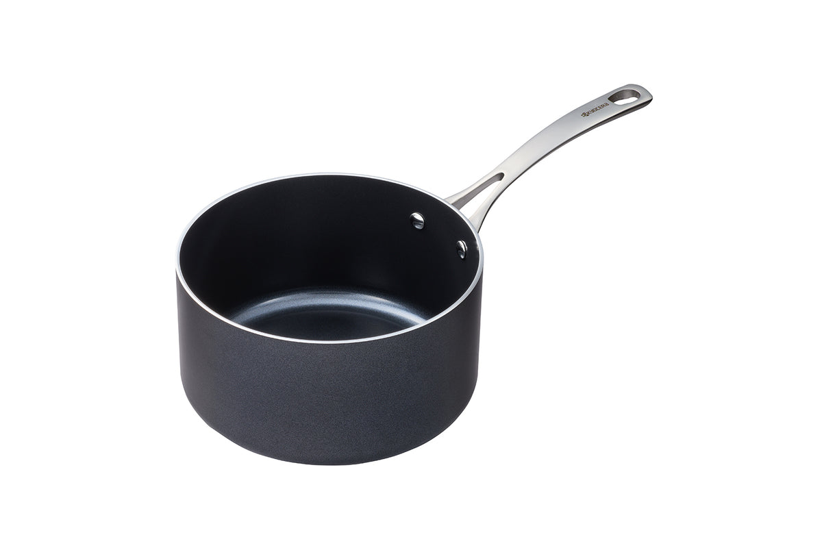 Black KYOCERA ceramic cooking pot with a smooth, durable surface, ideal for versatile kitchen use.