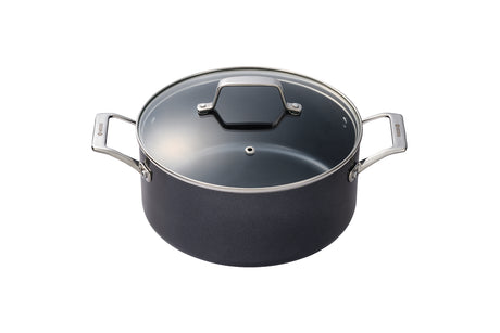Kyocera ceramic cooking pot in black, showcasing its sleek design and durable ceramic material for versatile kitchen use.