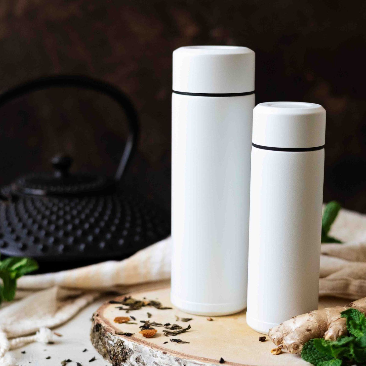 KYOCERA SLIM MUG insulated bottle in white, stainless steel design with a sleek, slim shape for hot and cold beverages.