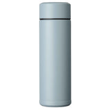 Blue KYOCERA slim mug insulated bottle with a sleek design, perfect for keeping beverages hot or cold on the go.