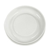 White KYOCERA ceramic grater with a sleek design, ideal for grating cheese, vegetables, and spices in the kitchen.