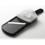 KYOCERA ceramic 4-stage hobel in black with adjustable settings and textured handle for precise slicing and peeling.