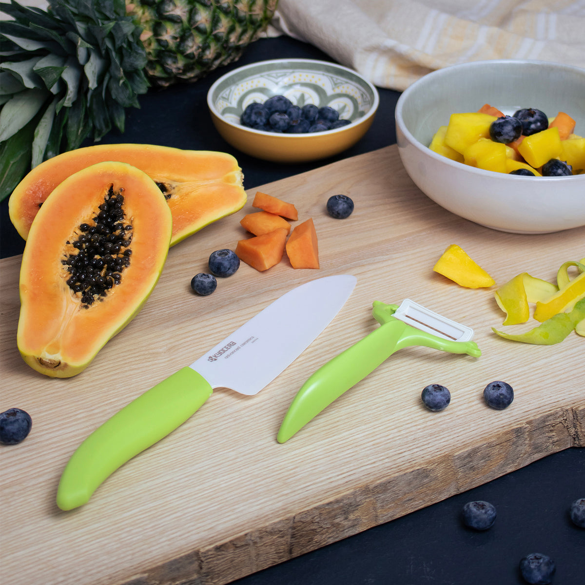 KYOCERA GEN GREEN ceramic knife with green handle and blade, ideal for precise slicing and kitchen use.