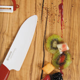 KYOCERA ceramic knife set with vegetable knife and peeler, featuring sleek, durable blades for precise kitchen prep.