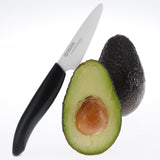 Black KYOCERA ceramic knife with a sleek handle, designed for precision cutting and durability in kitchen use.