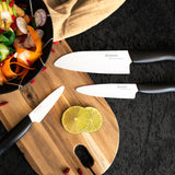 KYOCERA black ceramic knife with a sleek handle, ideal for precise slicing and cutting in the kitchen.