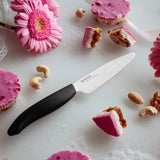 KYOCERA ceramic knife with black handle, GEN series, sharp and durable kitchen cutting tool.