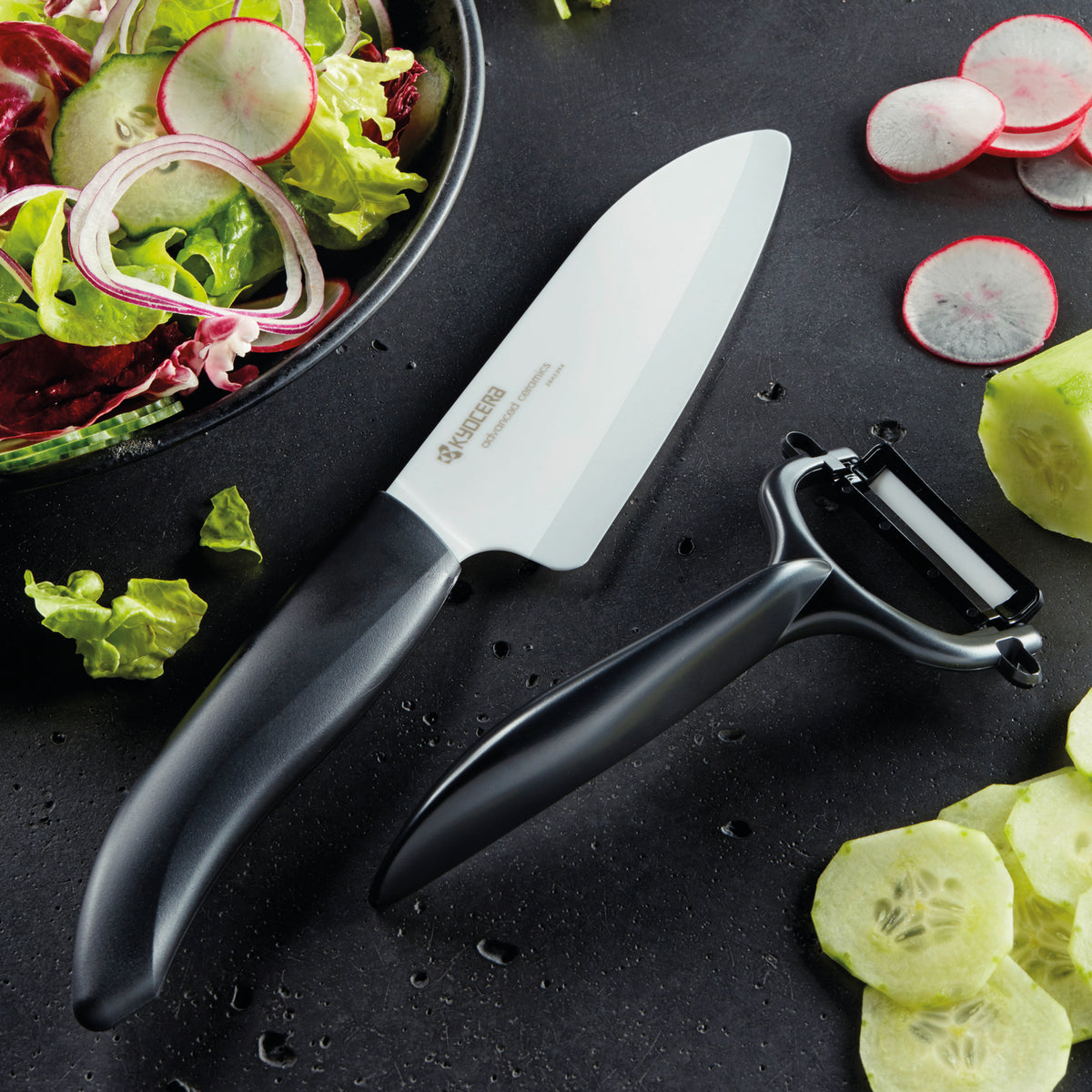 KYOCERA ceramic knife with black handle, GEN series, sharp and lightweight kitchen cutting tool, close-up view