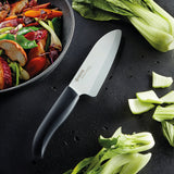 KYOCERA ceramic vegetable knife set with peeler, featuring sharp, durable ceramic blades for precise slicing and peeling.
