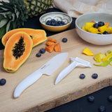 KYOCERA double-sided green vegetable peeler with sharp dual blades for efficient peeling.