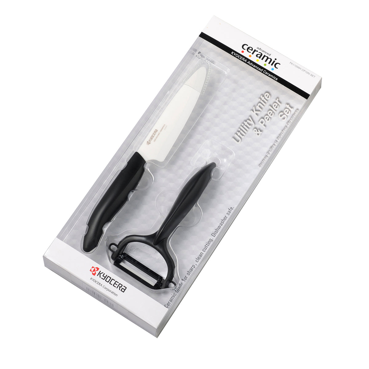 Kyocera ceramic vegetable knife set with peeler, featuring sleek white handles and sharp blades for precise kitchen prep.