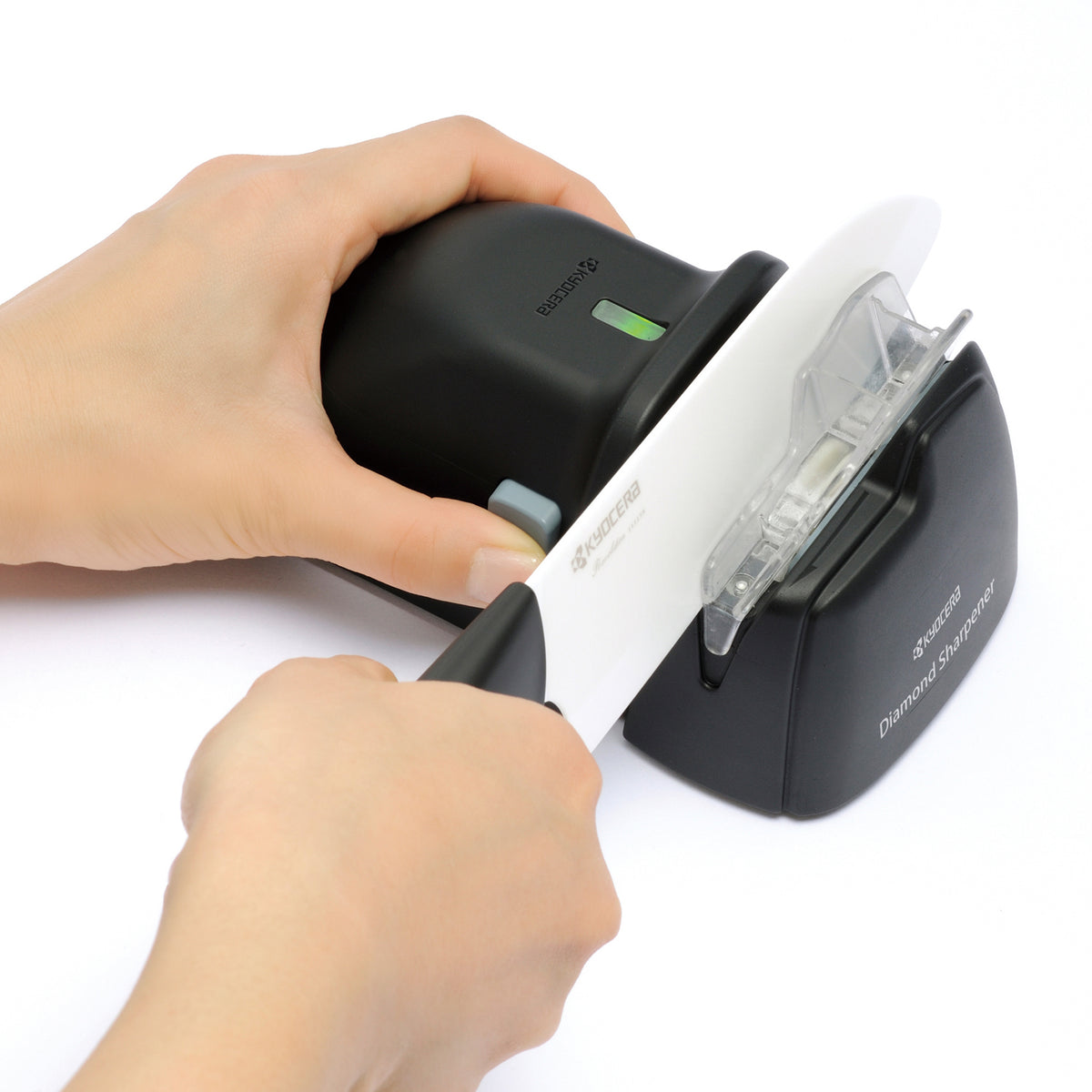 KYOCERA black plastic diamond knife sharpener with textured surface for precise blade sharpening
