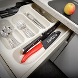 Black KYOCERA knife protector for blades up to 11 cm, designed to safely cover and protect kitchen knives.