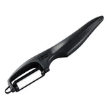 KYOCERA double-sided edge peeler with ergonomic handle and sharp blades, ideal for peeling fruits and vegetables.