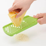 KYOCERA Slice & Grate 6-piece hobelset with red box, includes various stainless steel kitchen tools for slicing and grating