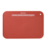 KYOCERA flexible black cutting mat, 37x25 cm, ideal for precise slicing and protecting surfaces during food preparation.