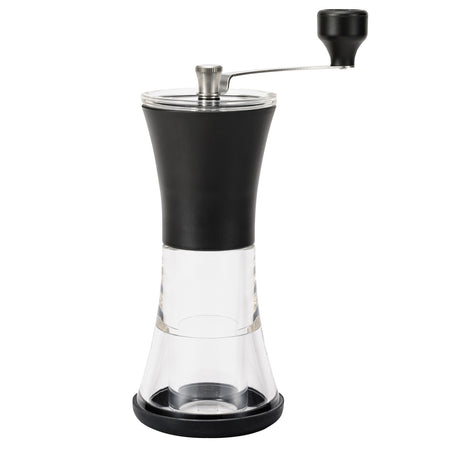 Black KYOCERA ceramic coffee grinder with lid, showing the sleek, modern design and grinding chamber in close-up.