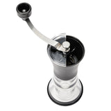 Kyocera ceramic coffee grinder with black body and lid, compact Mühle for fresh coffee grinding, detailed view of the device.
