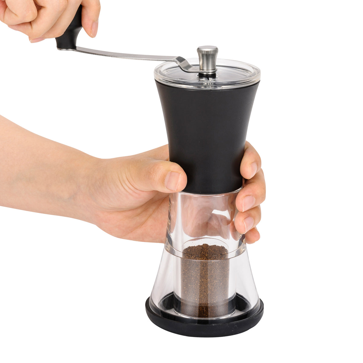 Black KYOCERA ceramic coffee mill with lid, compact Mühle for fresh coffee grinding, detailed close-up image.