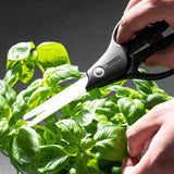 KYOCERA ceramic kitchen scissors in black and white with a durable handle, designed for precise cutting and kitchen tasks.