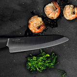 KYOCERA SHIN ceramic knife with black handle, sharp and durable for precise slicing and cutting in the kitchen.