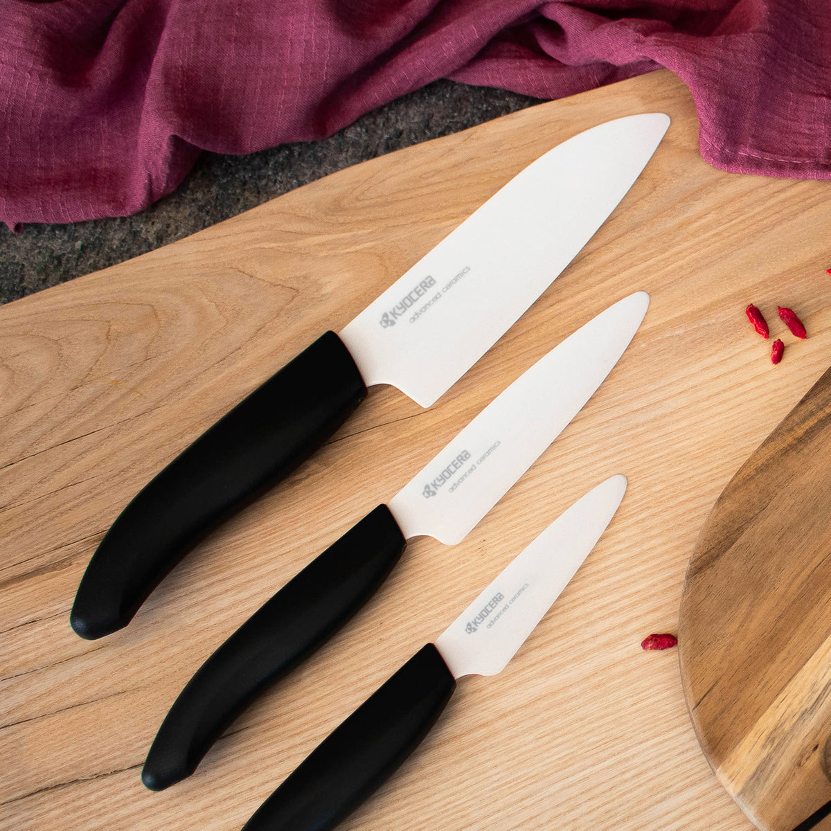 KYOCERA Gen Nature black ceramic knife with sleek handle and sharp blade for precise slicing and cutting.