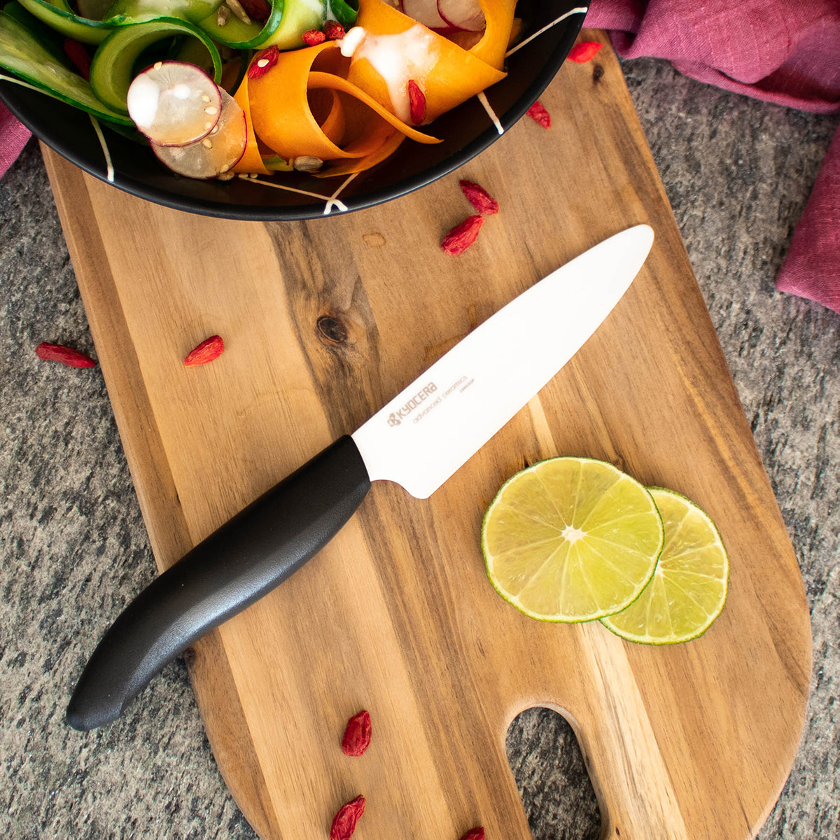 KYOCERA GEN NATURE black ceramic knife with sleek handle, designed for precise cutting and kitchen use.